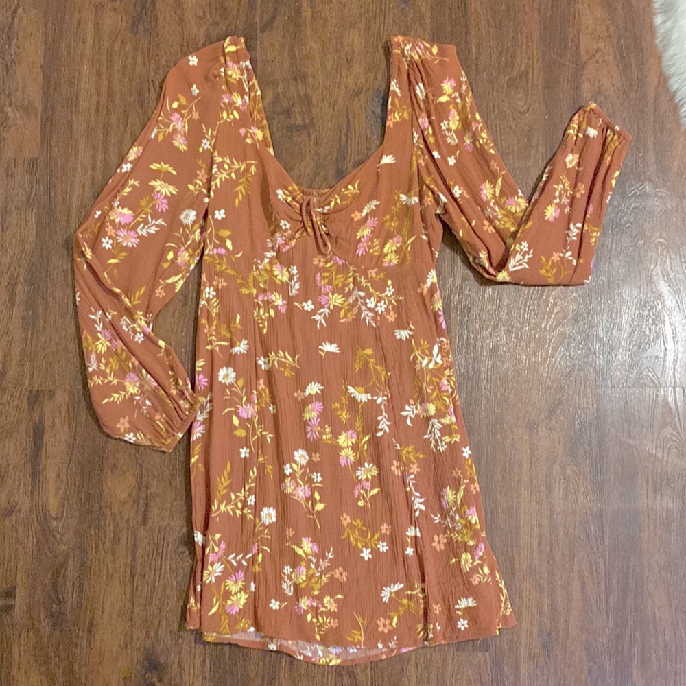 Orange floral mid-dress, never worn great condition. Drawstrings adjust cleavage
